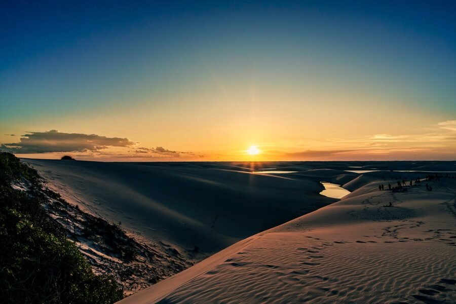 Freshwater lagoons between white sand dunes in Lençóis Maranhenses National Park, Brazil.