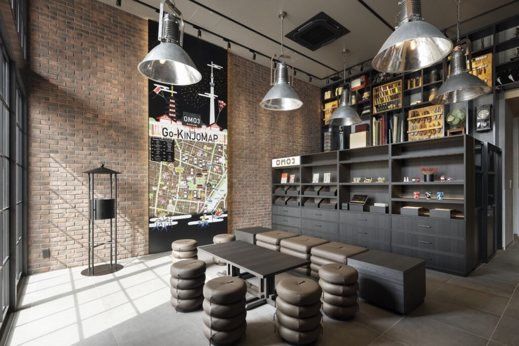 OMO Base lounge at OMO3 Asakusa with brick walls and a neighbourhood map