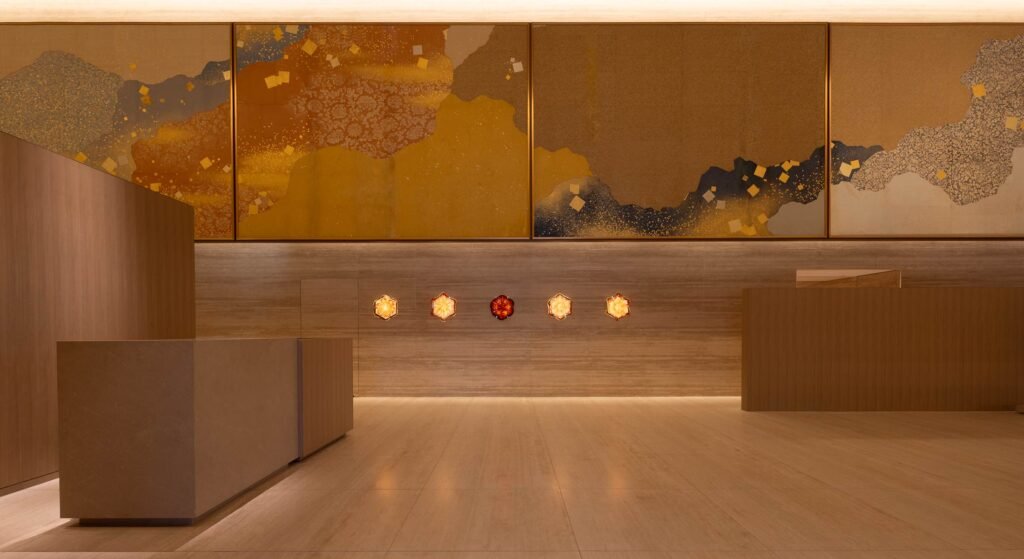 The Heritage Wing lobby at The Okura Tokyo with its gold screen and lantern lights