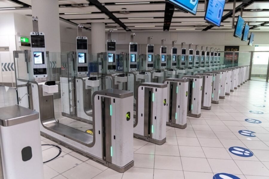 eGates in a UK airport arrivals hall.